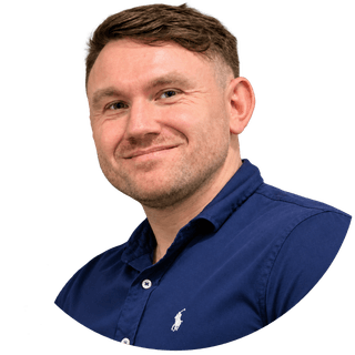 Sean Timoney of WeSure, smiling, in a navy shirt